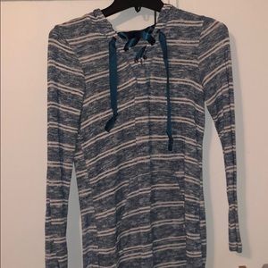 green and white shirt with strings